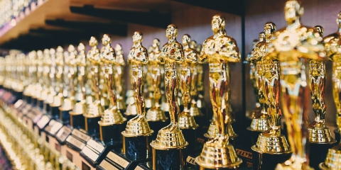 Offset image of awards statues lined up