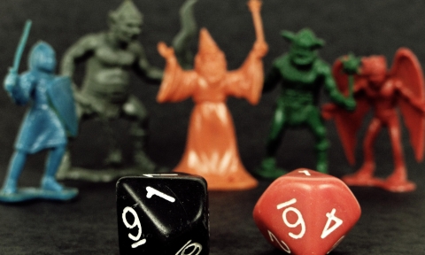 Image of dice and tabletop miniatures