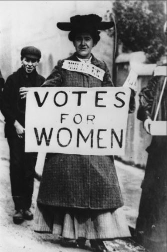 suffragette holding a voting rights sign