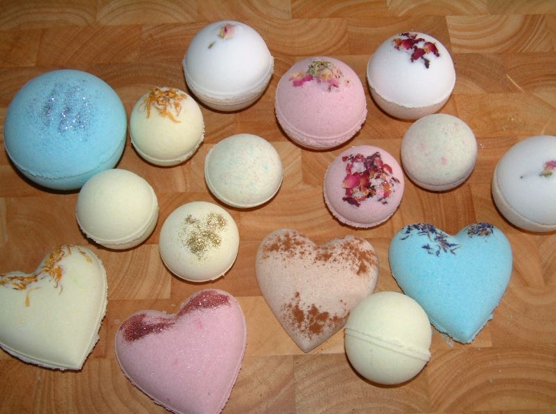 photo of different colored and shaped bath bombs