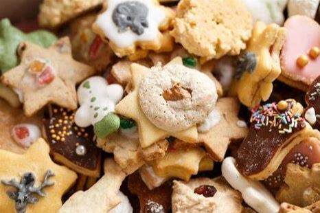 photo of a plate of a bunch of different cookies